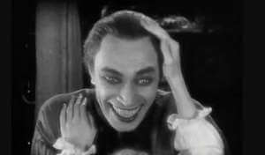 Conrad Veidt als Gwynplaine in Der Mann, der lacht aus dem Jahr 1928, Universal Pictures.